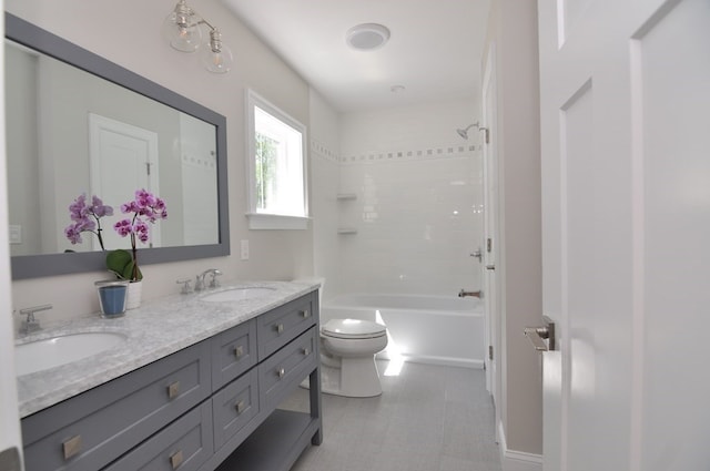 full bathroom with vanity, toilet, and tiled shower / bath