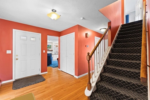 entrance foyer with light hardwood / wood-style floors