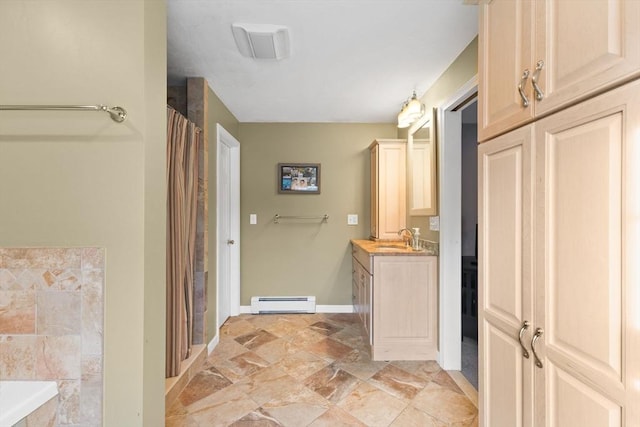 bathroom with vanity, separate shower and tub, and a baseboard heating unit