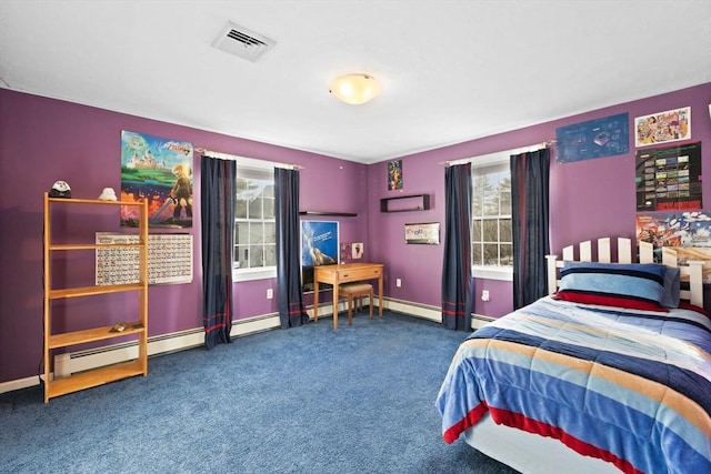 carpeted bedroom featuring baseboard heating