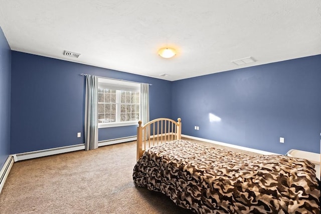 bedroom featuring carpet floors and baseboard heating