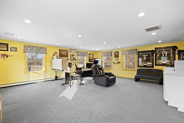 living room with a baseboard radiator and carpet