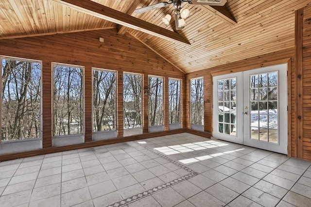 unfurnished sunroom featuring a healthy amount of sunlight, french doors, vaulted ceiling with beams, and wooden ceiling