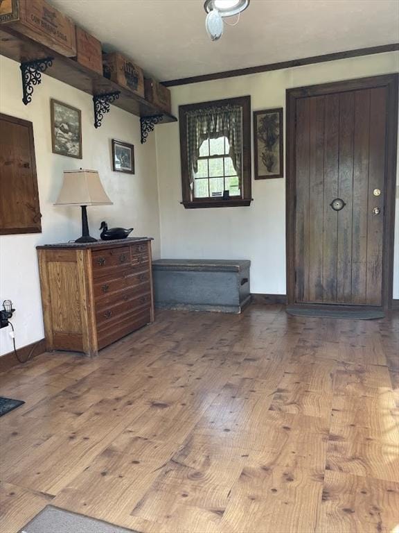 33 Whittemore St, Leicester, MA 01524 - entrance foyer with wood finished floors, baseboards, and ornamental molding