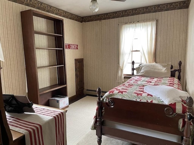 33 Whittemore St, Leicester, MA 01524 - carpeted bedroom with wallpapered walls and a baseboard heating unit