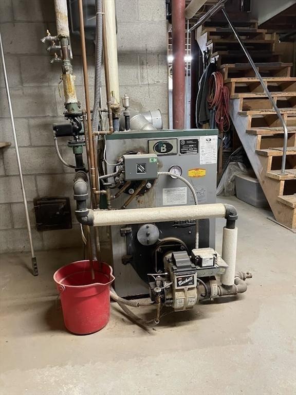 33 Whittemore St, Leicester, MA 01524 - utility room with a heating unit