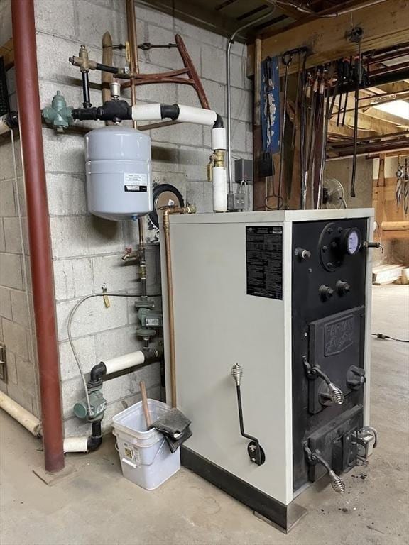 33 Whittemore St, Leicester, MA 01524 - utility room featuring a heating unit