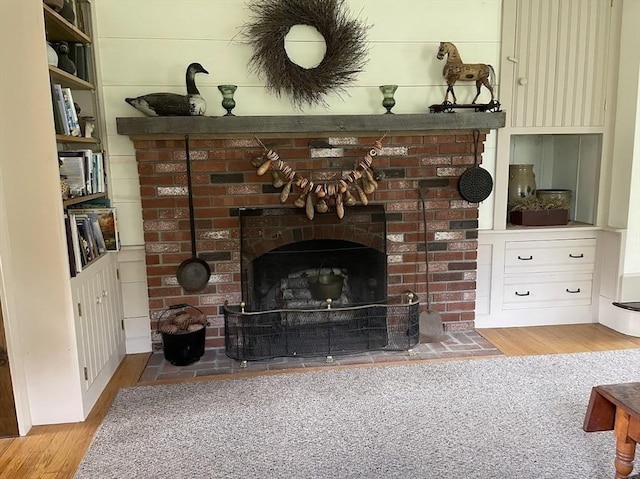 33 Whittemore St, Leicester, MA 01524 - detailed view of wood finished floors and a fireplace