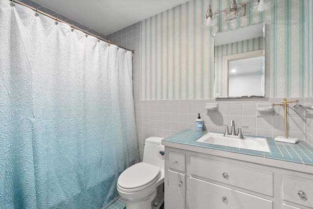 153 Old Connecticut Path, Wayland, MA 01778 - bathroom featuring wallpapered walls, vanity, tile walls, a wainscoted wall, and a shower with shower curtain