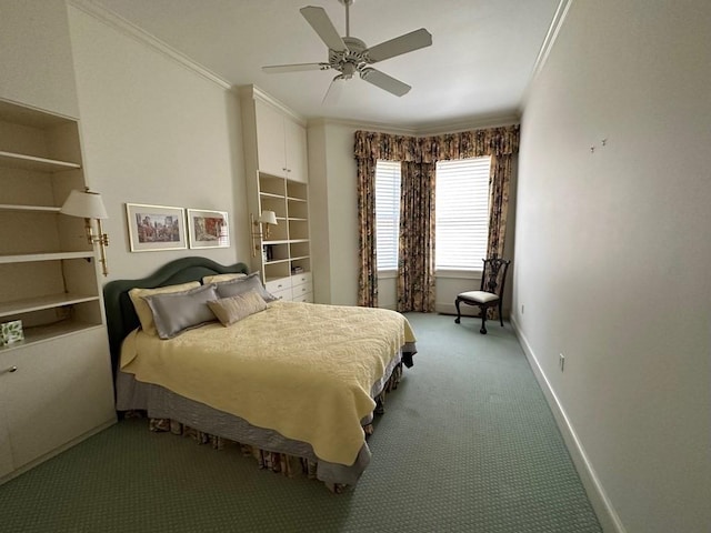 bedroom featuring crown molding, baseboards, carpet floors, and a ceiling fan