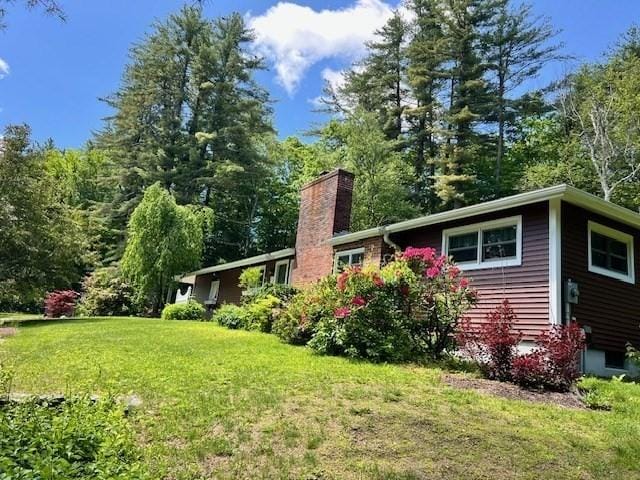 148 Walnut Hill Rd, Orange, MA 01364 - rear view of property featuring a yard and a chimney