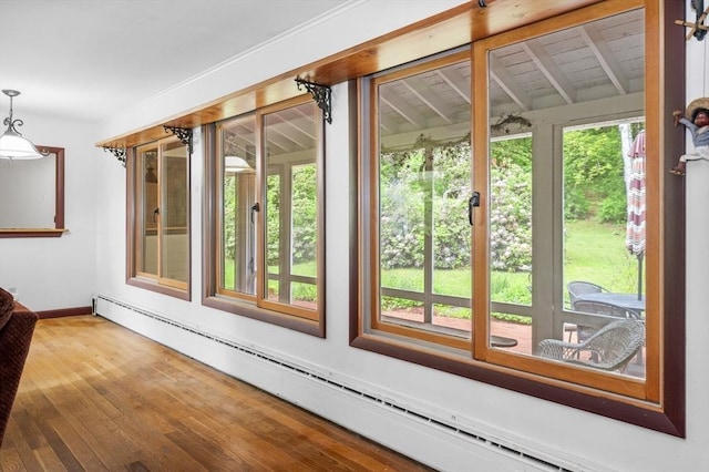 148 Walnut Hill Rd, Orange, MA 01364 - unfurnished sunroom with a baseboard heating unit and hardwood / wood-style flooring