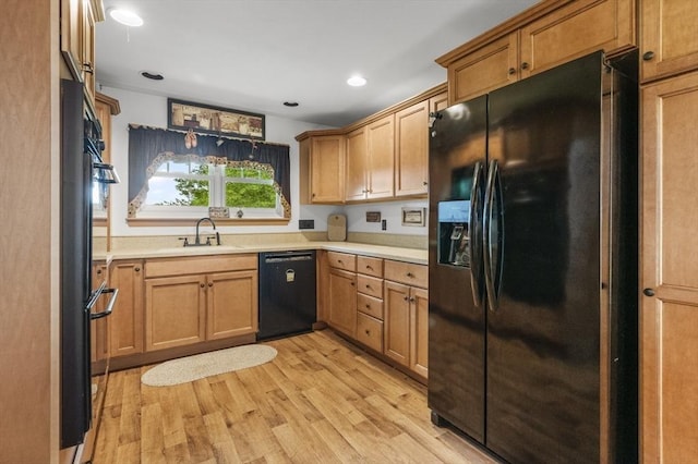 148 Walnut Hill Rd, Orange, MA 01364 - kitchen with black appliances, light wood-style flooring, light countertops, and recessed lighting