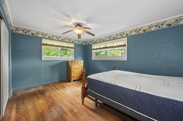148 Walnut Hill Rd, Orange, MA 01364 - bedroom with hardwood / wood-style flooring, a ceiling fan, and crown molding