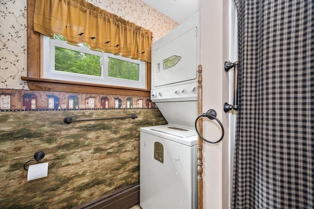 148 Walnut Hill Rd, Orange, MA 01364 - washroom featuring stacked washing machine and dryer and wallpapered walls