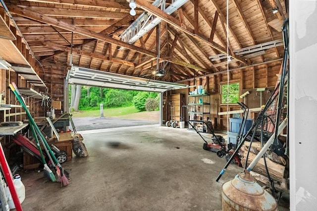 148 Walnut Hill Rd, Orange, MA 01364 - garage featuring a garage door opener and wood ceiling