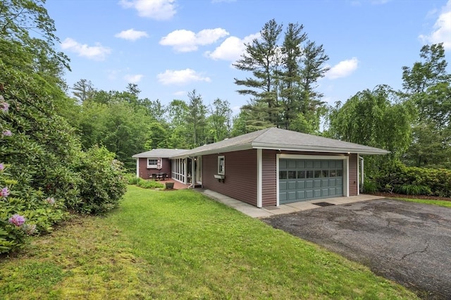 148 Walnut Hill Rd, Orange, MA 01364 - view of front of home with a front lawn and an attached garage