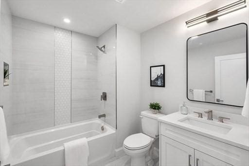 260 Elm St Unit 204, Everett, MA 02149 - bathroom featuring vanity, toilet, bathtub / shower combination, and recessed lighting