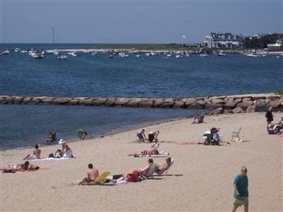 property view of water featuring a beach view