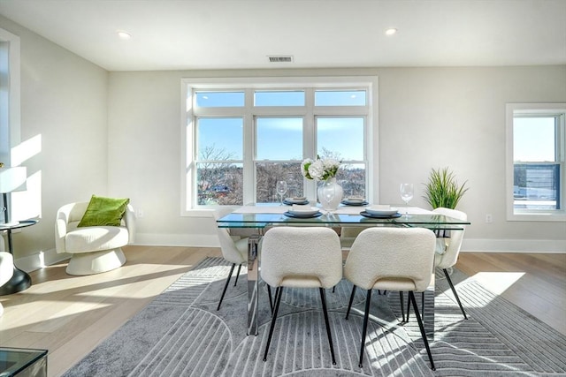62 Foundry St Unit 215, Wakefield, MA 01880 - dining space featuring wood finished floors and recessed lighting