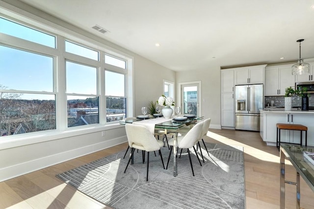 62 Foundry St Unit 215, Wakefield, MA 01880 - dining area with light wood-style flooring and recessed lighting