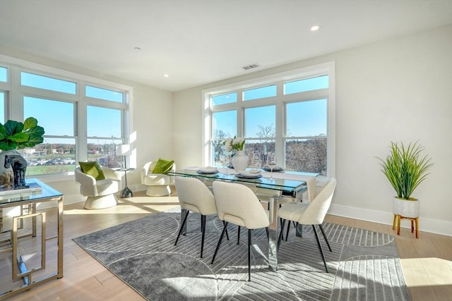 62 Foundry St Unit 215, Wakefield, MA 01880 - dining area with wood finished floors and recessed lighting