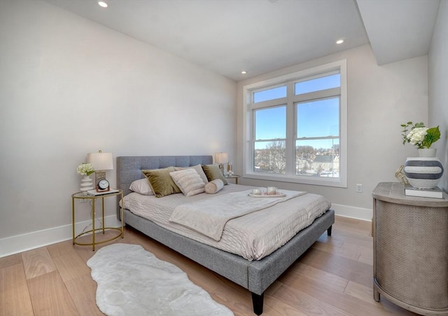 62 Foundry St Unit 215, Wakefield, MA 01880 - bedroom with wood finished floors and recessed lighting