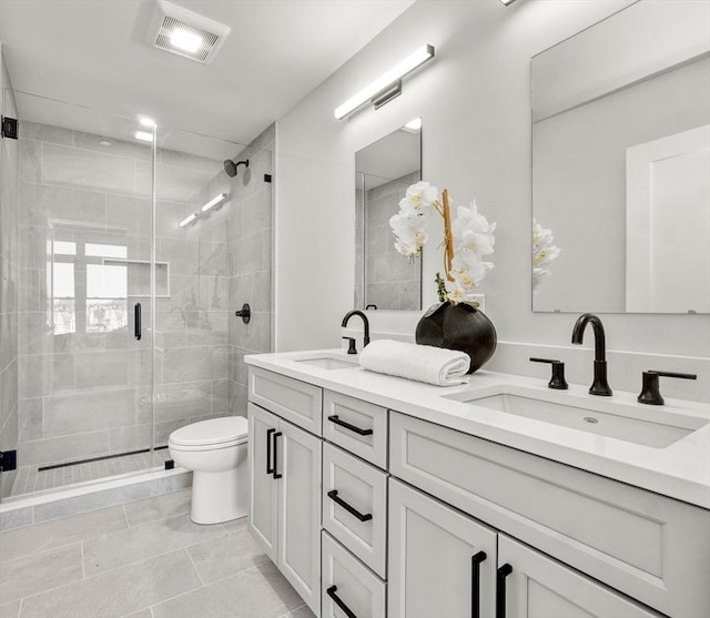62 Foundry St Unit 215, Wakefield, MA 01880 - full bathroom featuring double vanity and a shower stall