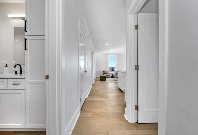 62 Foundry St Unit 215, Wakefield, MA 01880 - hall featuring light wood-style flooring and recessed lighting