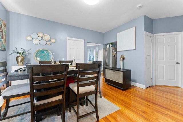 dining room featuring hardwood / wood-style flooring