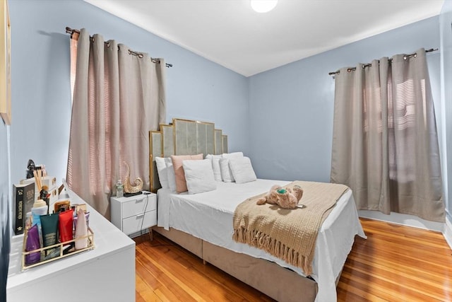 bedroom featuring light wood-type flooring