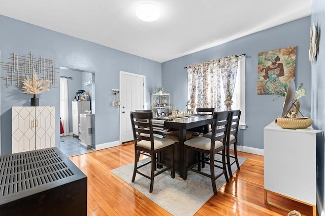 dining room with hardwood / wood-style floors