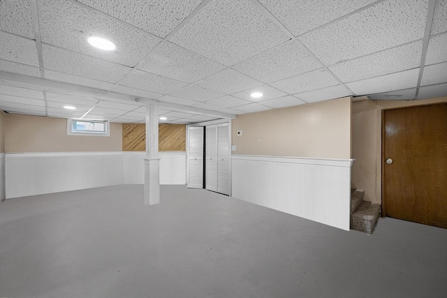 83 Summit Rd, Abington, MA 02351 - below grade area with stairs, a paneled ceiling, a wainscoted wall, and recessed lighting