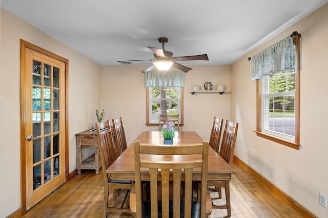 83 Summit Rd, Abington, MA 02351 - dining room with wood finished floors, a ceiling fan, and baseboards