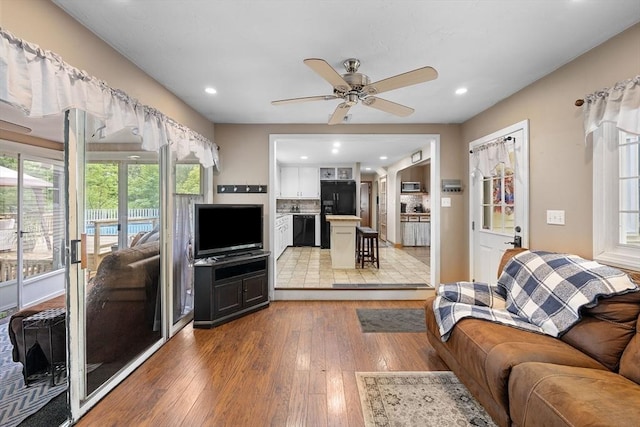83 Summit Rd, Abington, MA 02351 - living room with plenty of natural light, light wood-style floors, ceiling fan, and recessed lighting