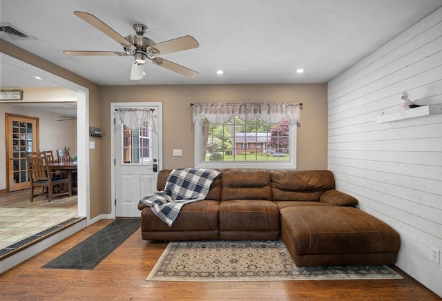 83 Summit Rd, Abington, MA 02351 - living area with wood finished floors, recessed lighting, ceiling fan, and wooden walls