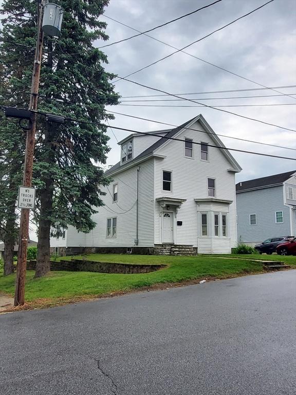 10 Stevens St, Lawrence, MA 01843 - view of front of home featuring a front yard