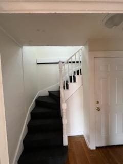 10 Stevens St, Lawrence, MA 01843 - staircase with wood finished floors and baseboards