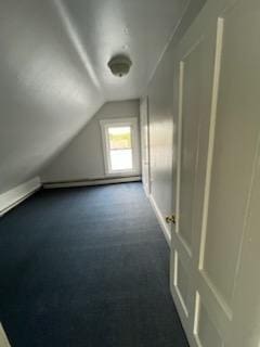 10 Stevens St, Lawrence, MA 01843 - bonus room with lofted ceiling and dark carpet