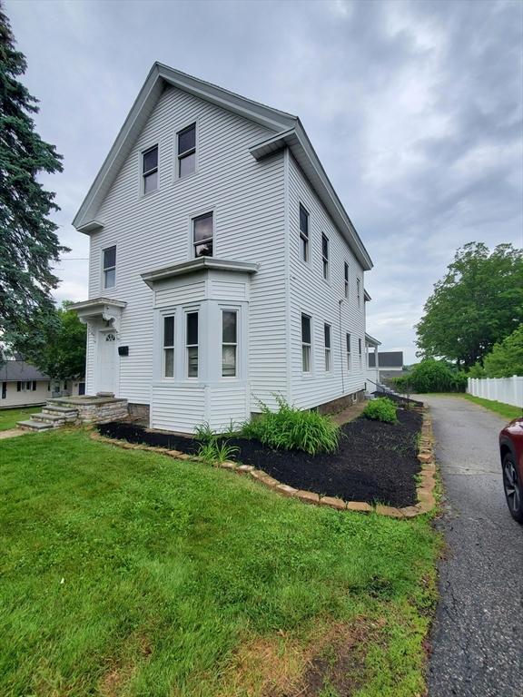 10 Stevens St, Lawrence, MA 01843 - view of property exterior with a lawn