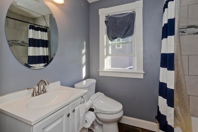 bathroom with toilet, curtained shower, and vanity