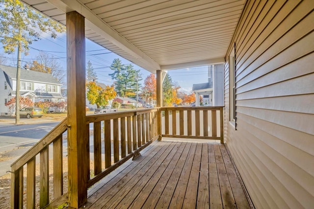 wooden terrace with a porch