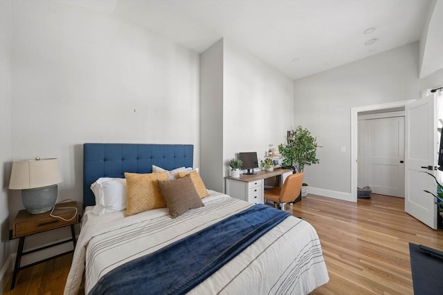 bedroom featuring light wood-type flooring