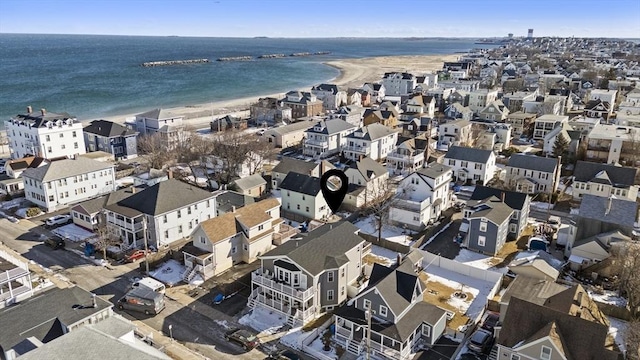 drone / aerial view with a view of the beach and a water view