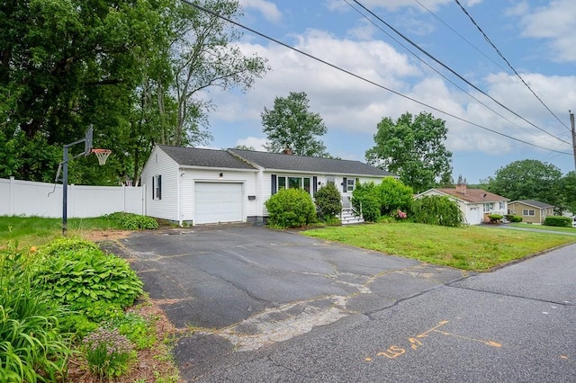 3 Sears Ave, Webster, MA 01570 - single story home with asphalt driveway and a garage