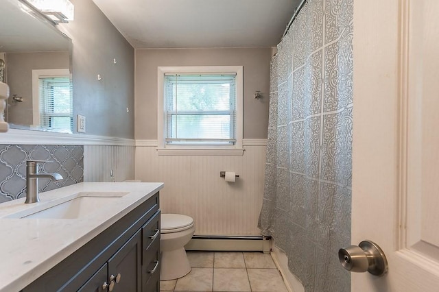 3 Sears Ave, Webster, MA 01570 - full bathroom featuring baseboard heating, a wainscoted wall, tile patterned floors, vanity, and a shower with curtain