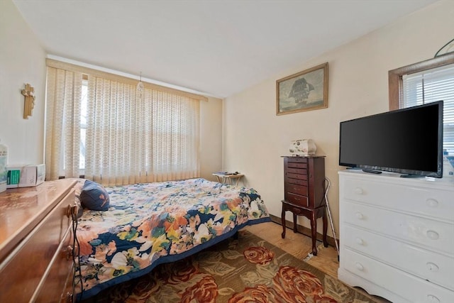 bedroom featuring wood finished floors