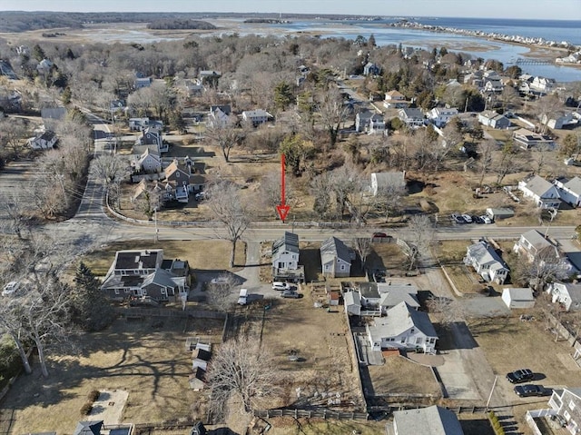 aerial view with a residential view and a water view