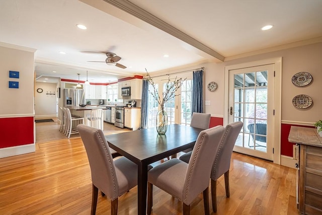 dining space featuring crown molding, recessed lighting, ceiling fan, and light wood-type flooring