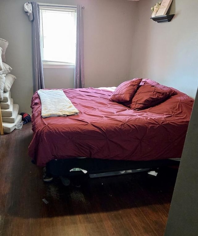 bedroom with wood-type flooring